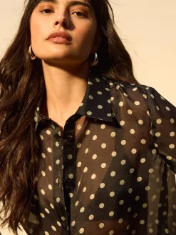 - Overhemd met doorschijnende lange mouwen*Next New