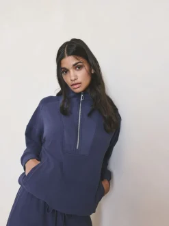 - Fleece met rits tot aan de borst*Next New