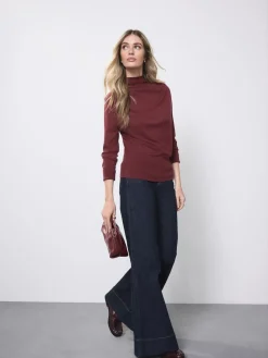 - High Rise stretchy Jeans met wijde pijpen*Next