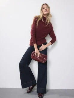 - High Rise stretchy Jeans met wijde pijpen*Next