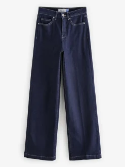 - Jeans met zandloperpasvorm en wijde pijpen*Next Outlet