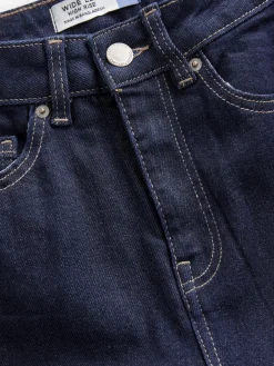 - Jeans met zandloperpasvorm en wijde pijpen*Next Outlet