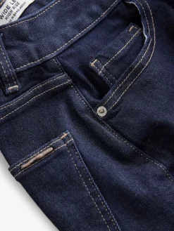 - Jeans met zandloperpasvorm en wijde pijpen*Next Outlet