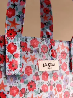 Blauwe vouwbare sterretjesprint - Kleine gecoate boekentas*Cath Kidston
