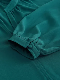 Blauwgroen - Blouse met V-hals en lange mouwen*Next New