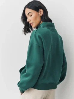 - Relaxed fit sweatshirt van zware katoenrijke jersey met ritssluiting bij de hals*Next Online