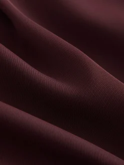 - Broek met wijde pijpen en elastiek in de achterkant*Next