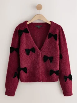 - Gebreid vest met fluwelen strik*Next