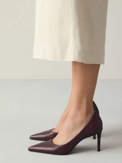 - Leren mid-court pumps*Next