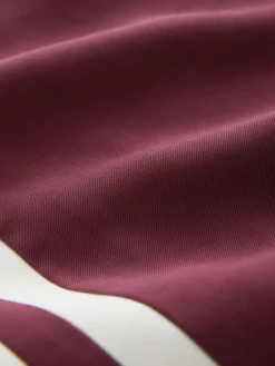 - Wijduitlopende broek met streep langs de zijkanten*Next Clearance