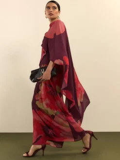 - Lange jurk met cape*Next Online