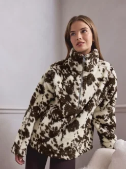 Bruin met koeprint - Borg fleece met korte rits*Next Outlet