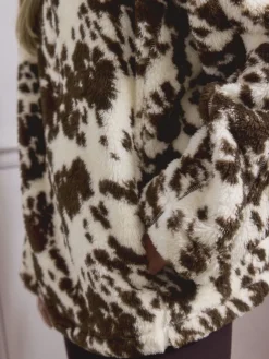 Bruin met koeprint - Borg fleece met korte rits*Next Outlet