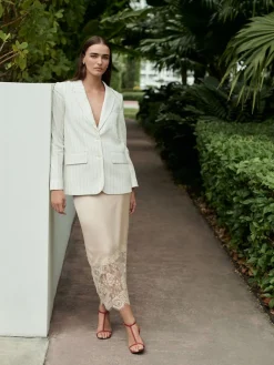 - Satijn Midi-rok met kanten afwerking*Next