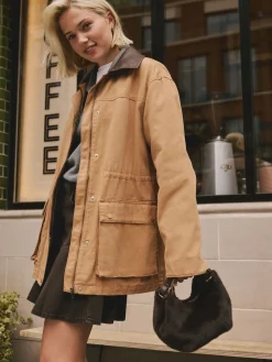 - Crossbodytas van imitatiebont*Next