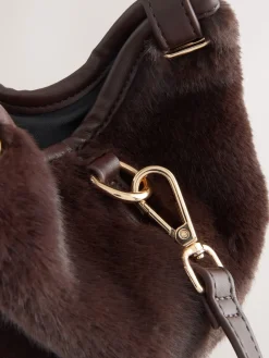 - Crossbodytas van imitatiebont*Next