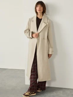 - Lange maxi-jas*Next Best