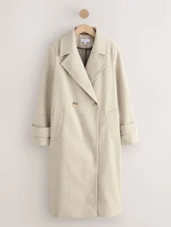 - Lange maxi-jas*Next Best