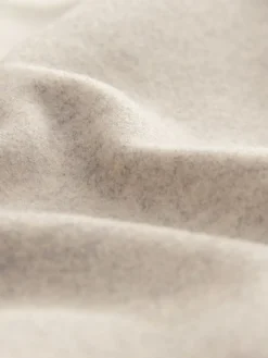 - Lange maxi-jas*Next Best