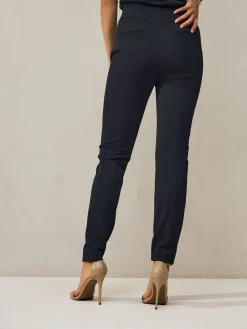 - Corrigerende broek met grote zakken*Next