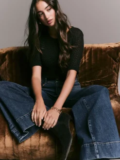 - High Rise stretchy Jeans met wijde pijpen*Next Best