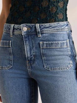 - Jeans met wijde pijpen en opgestikte zakken*Next Discount