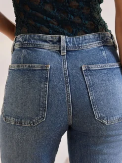 - Jeans met wijde pijpen en opgestikte zakken*Next Discount