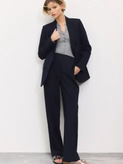 - Op maat gemaakte blazer met enkele rij knopen van wol*Next New