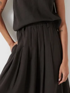 - Ivy Pleated Linen Blend Midi Skirt*Hush New
