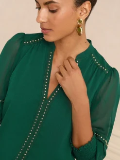 - blouse met V-hals en hardware met 3/4 mouwen*Love & Roses New