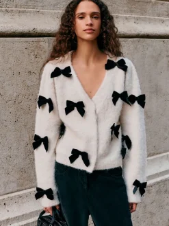 - Gebreid vest met fluwelen strik*Next Clearance