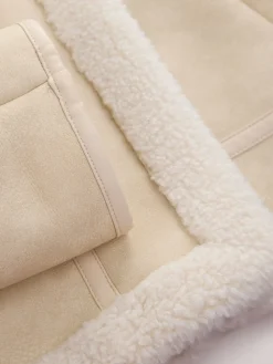 - Pilotenjack met trechterkraag en borgvoering*Next Best