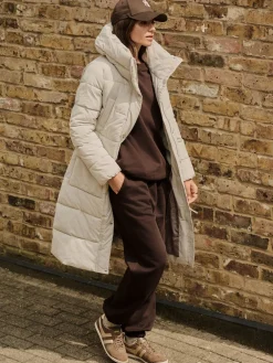 Ecru-crème - Regenbestendige gewatteerde lange jas met capuchon*Next Best