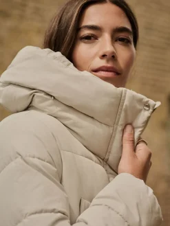 Ecru-crème - Regenbestendige gewatteerde lange jas met capuchon*Next Best