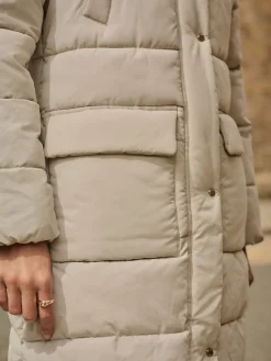 Ecru-crème - Regenbestendige gewatteerde lange jas met capuchon*Next Best