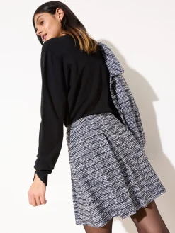 - Geplooide bouclé minirok*Friends Like These Best