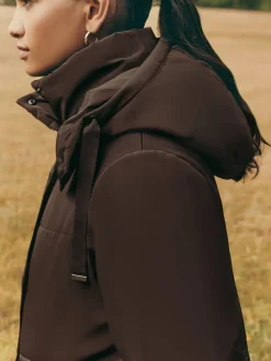 - Lange gewatteerde jas met capuchon*Friends Like These Online