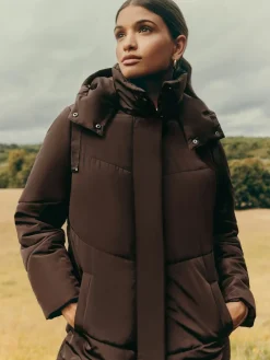 - Lange gewatteerde jas met capuchon*Friends Like These Online