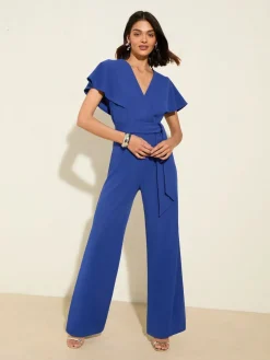 Jumpsuit met korte ruchemouwen en overslag in scuba-stof*Friends Like These