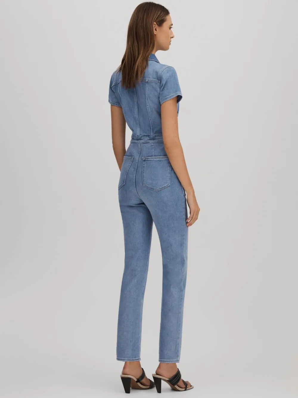 - Skinny denim jumpsuit*Good American Online