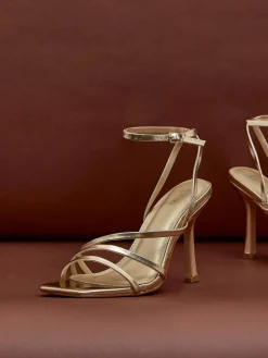 Goud - Scarlett sandalen met bandjes, hak en enkelbandje*Linzi Best