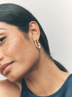 - Gekruiste oorringen*Next Sale