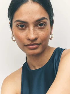 - Gekruiste oorringen*Next Sale