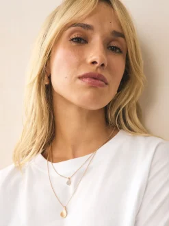 - Gelaagde ketting met glinsterende blaadjes*Next Sale