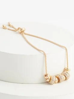 - Glinsterende trekarmband met popcornkralen*Next Sale