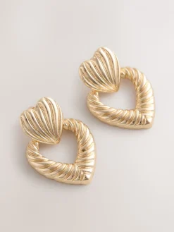 Goudkleurig - Opvallende hartjesoorbellen*Next