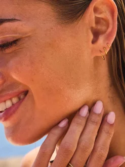 - Stainless Steel Graduated Huggie Hoop Earrings 3 Pack*Next Best