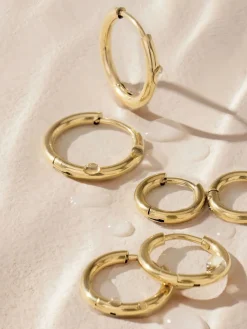 - Stainless Steel Graduated Huggie Hoop Earrings 3 Pack*Next Best