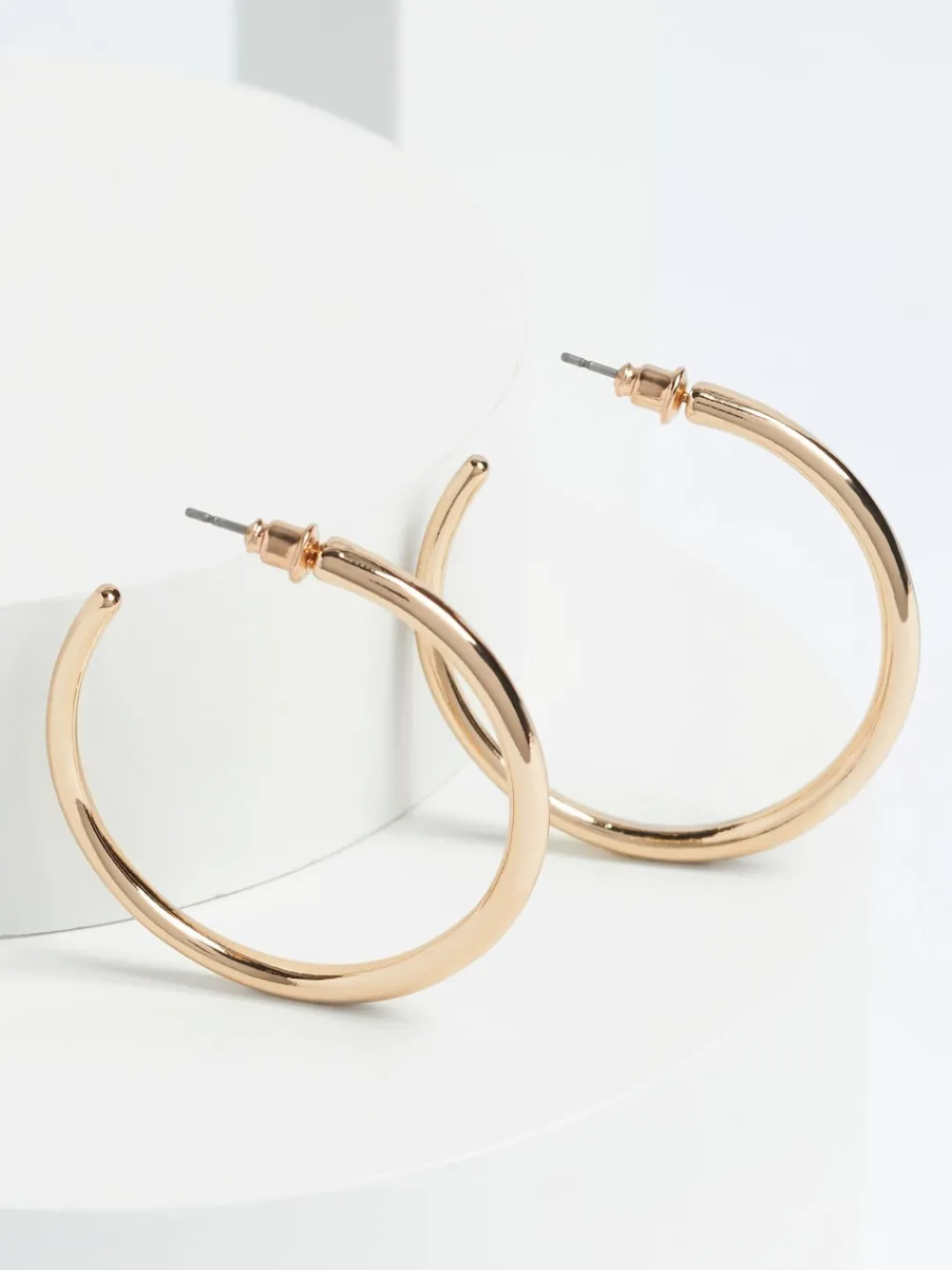 - Tap toelopende oorringen*Next Discount