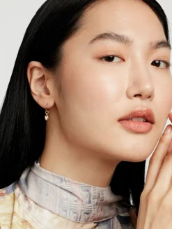 - HARRYE: omhullende oorringen met klein hartje*Ted Baker Clearance